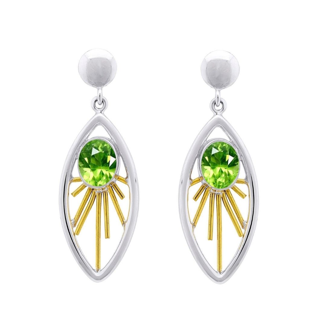 The Goddess Earrings by Gallardo & Blaine Designs feature oval green gemstones framed by gold sunburst accents in a marquise-shaped sterling silver drop design—an elegant statement in various gemstones.